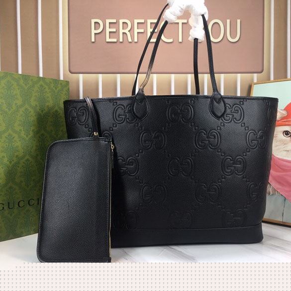 G*u*i shopping bags